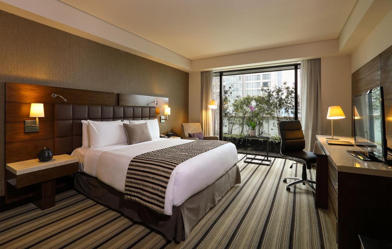 Deluxe Guest room, 1 King Bed, City view,1273687846:JPEG