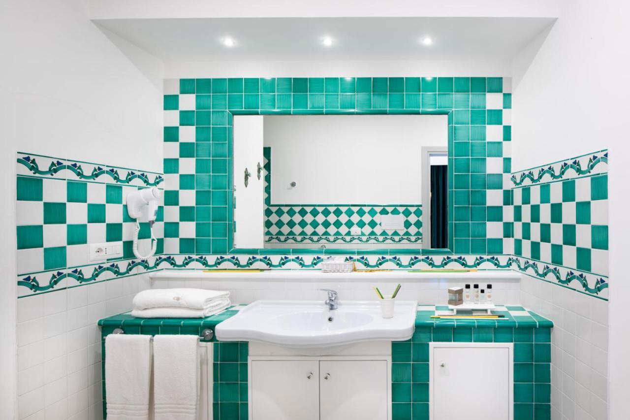 Deluxe Quadruple Room with Terrace and Sea View