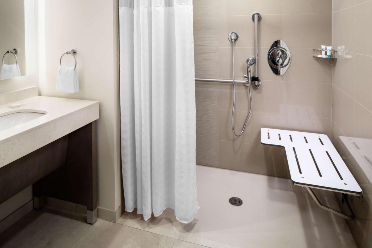 One-Bedroom Suite with Two Queen Beds with Sofa Bed, Kitchen and Roll-In Shower - Disability Access