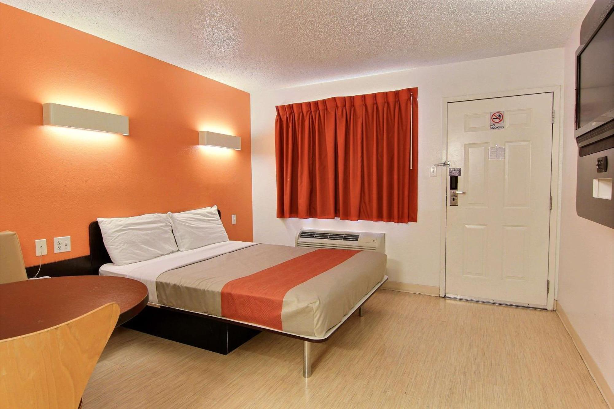 1 Queen Bed | Mini Fridge