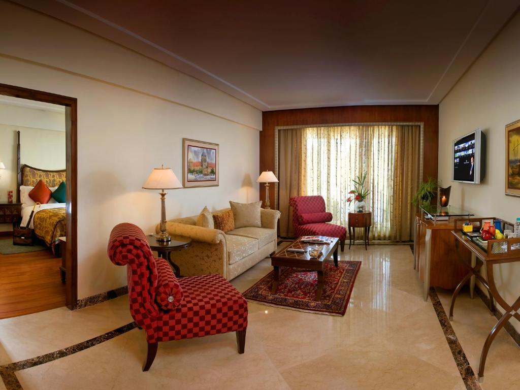 Lalit Executive Suite, King Bed with Complimentary One way Airport Transfers , 15% off on session on Spa and Enjoy Happy Hours with 1+1 offer on Beverages