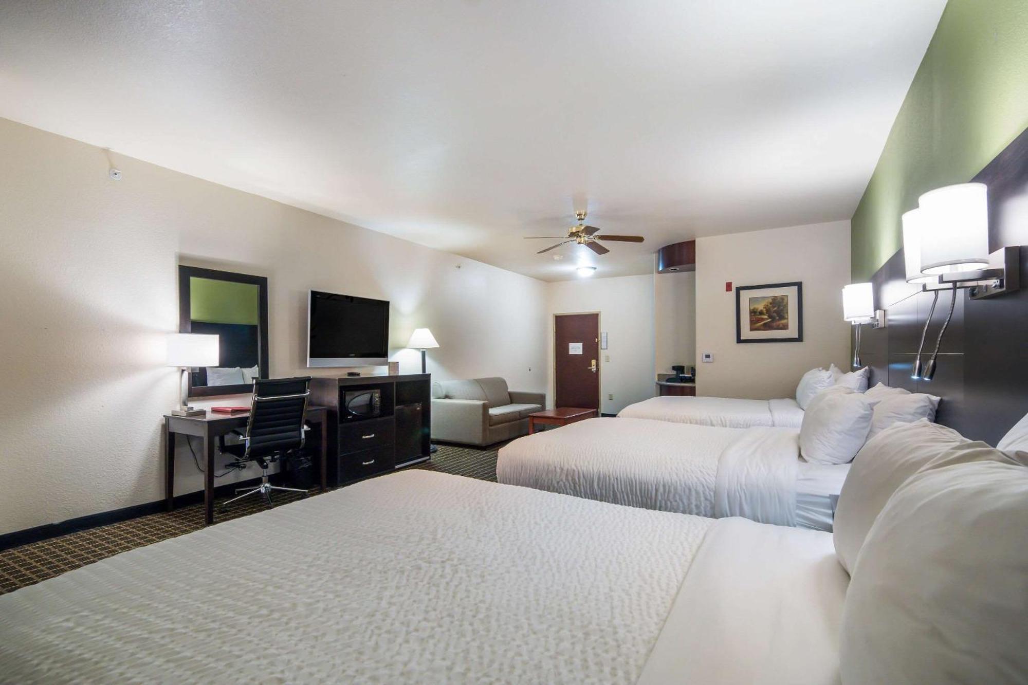 Queen Suite with Three Queen Beds and Sofa Bed - Non-Smoking