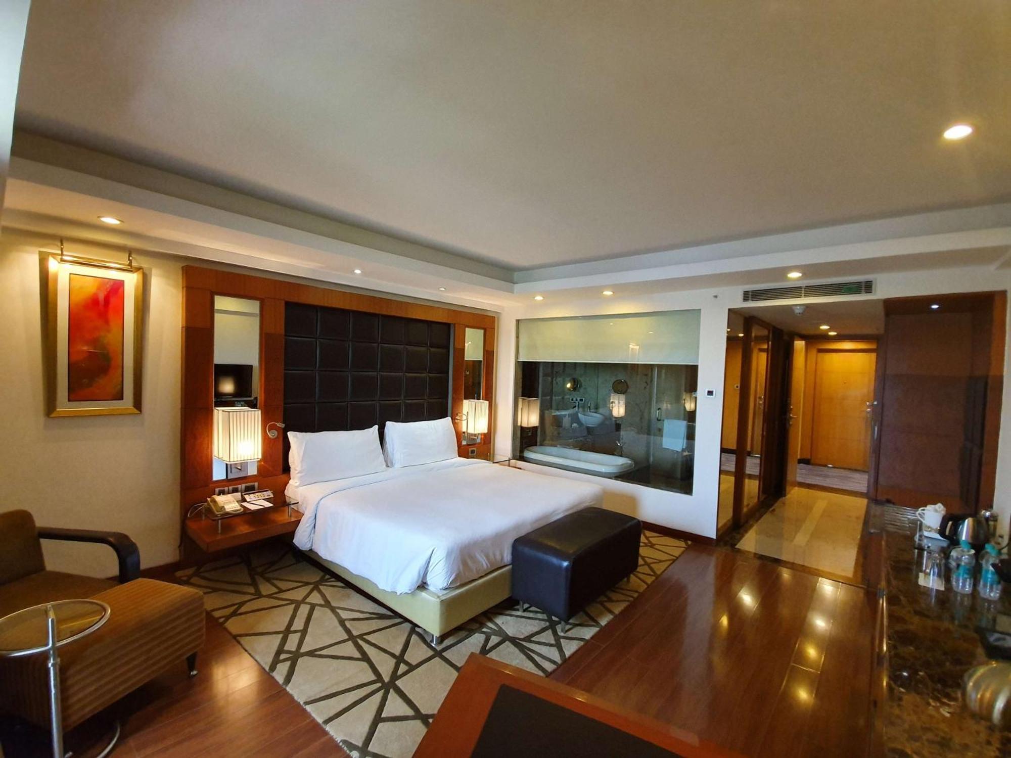 Junior Suite with Happy Hours 01:00 PM to 06:00 PM ,Airport Transfers,Early Check In at 10 AM (Subject to availability), 20% Discount on Food & Beverage,1430156440:JPEG