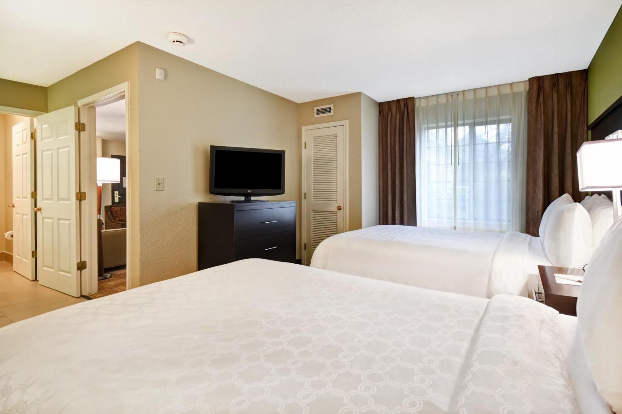 Two-Bedroom Suite with One Queen Bed and Two Double Beds - Non-Smoking