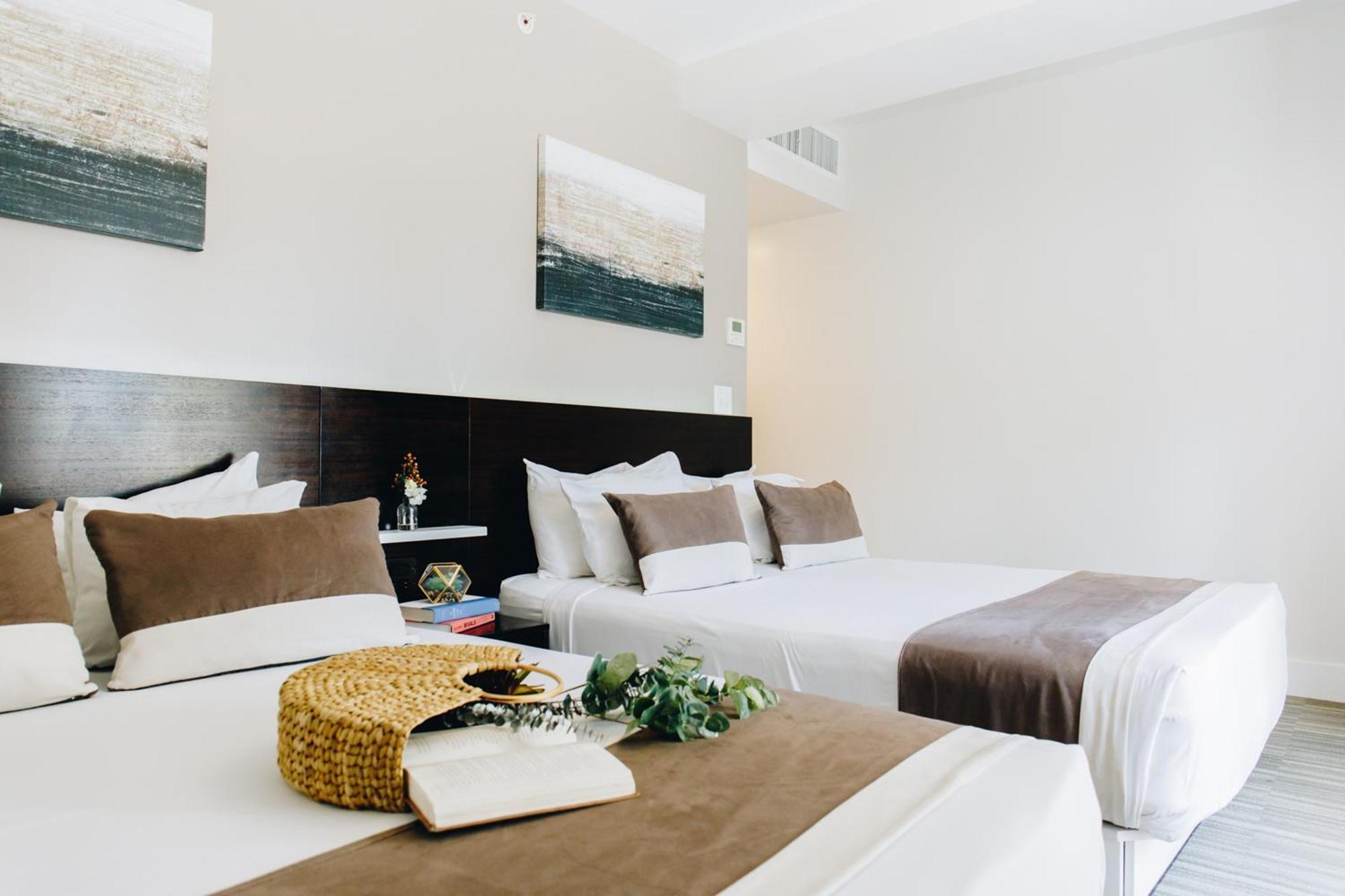 Deluxe Double Queen Room with Balcony