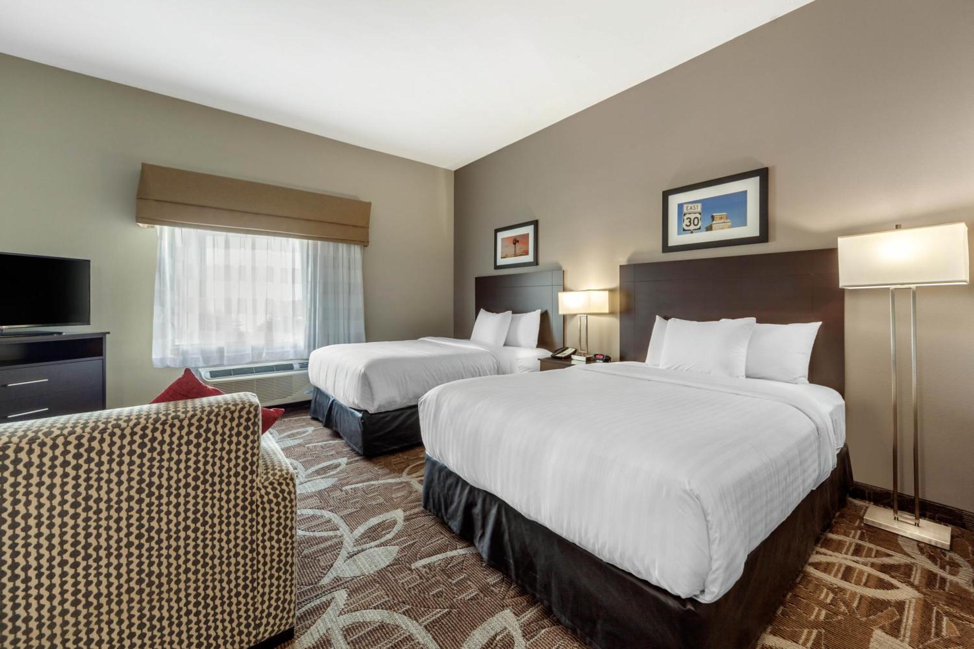 Queen Suite with Two Queen Beds and Sofa Bed