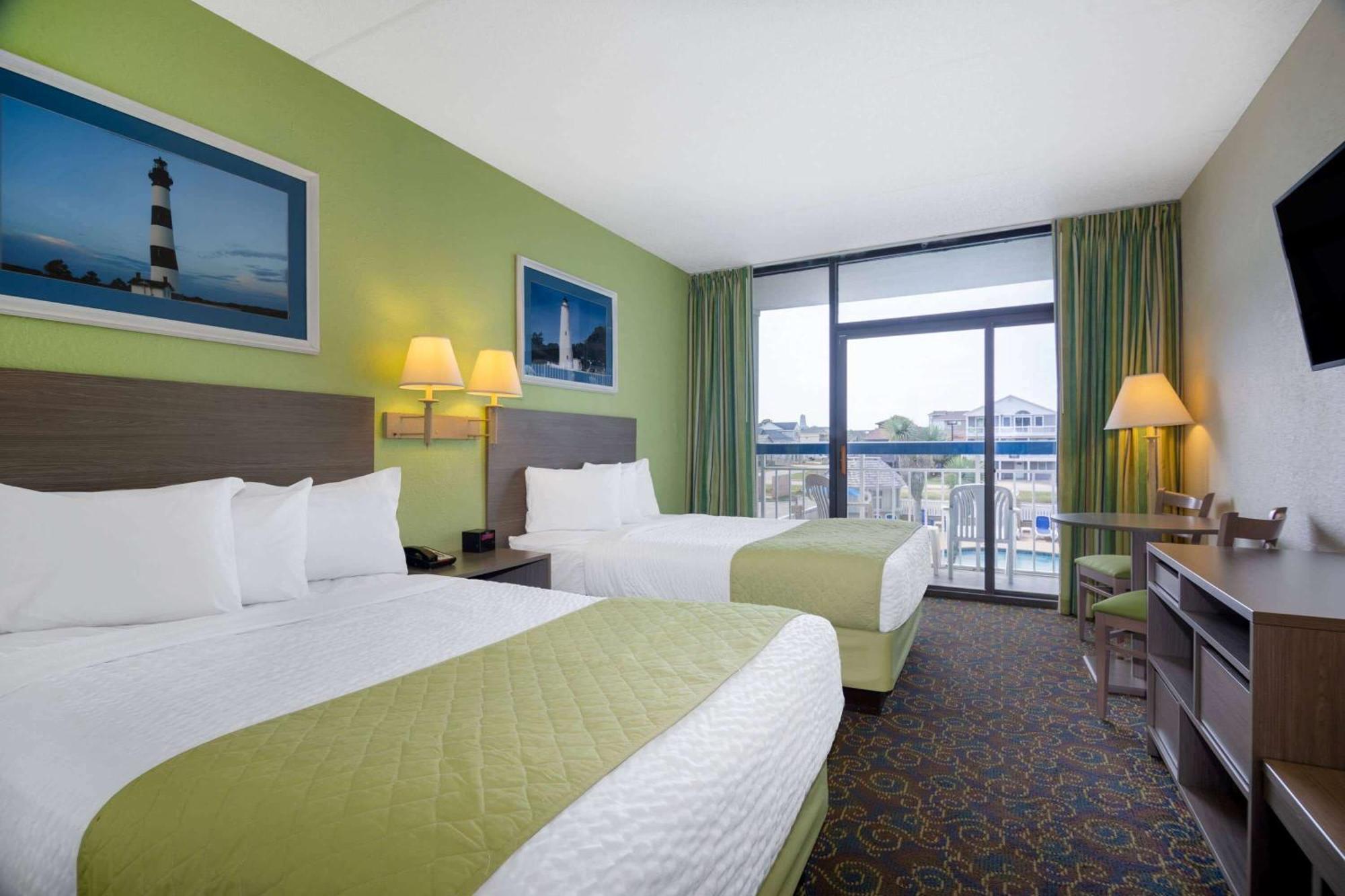 Queen Room with Two Queen Beds and Pool View on First Floor - Pet Friendly/Non-Smoking