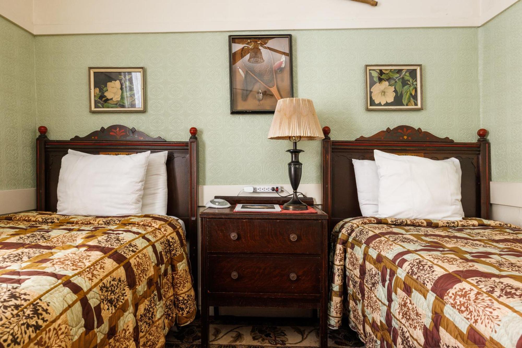 Two Twin-Sized Beds with Shared Bathroom
