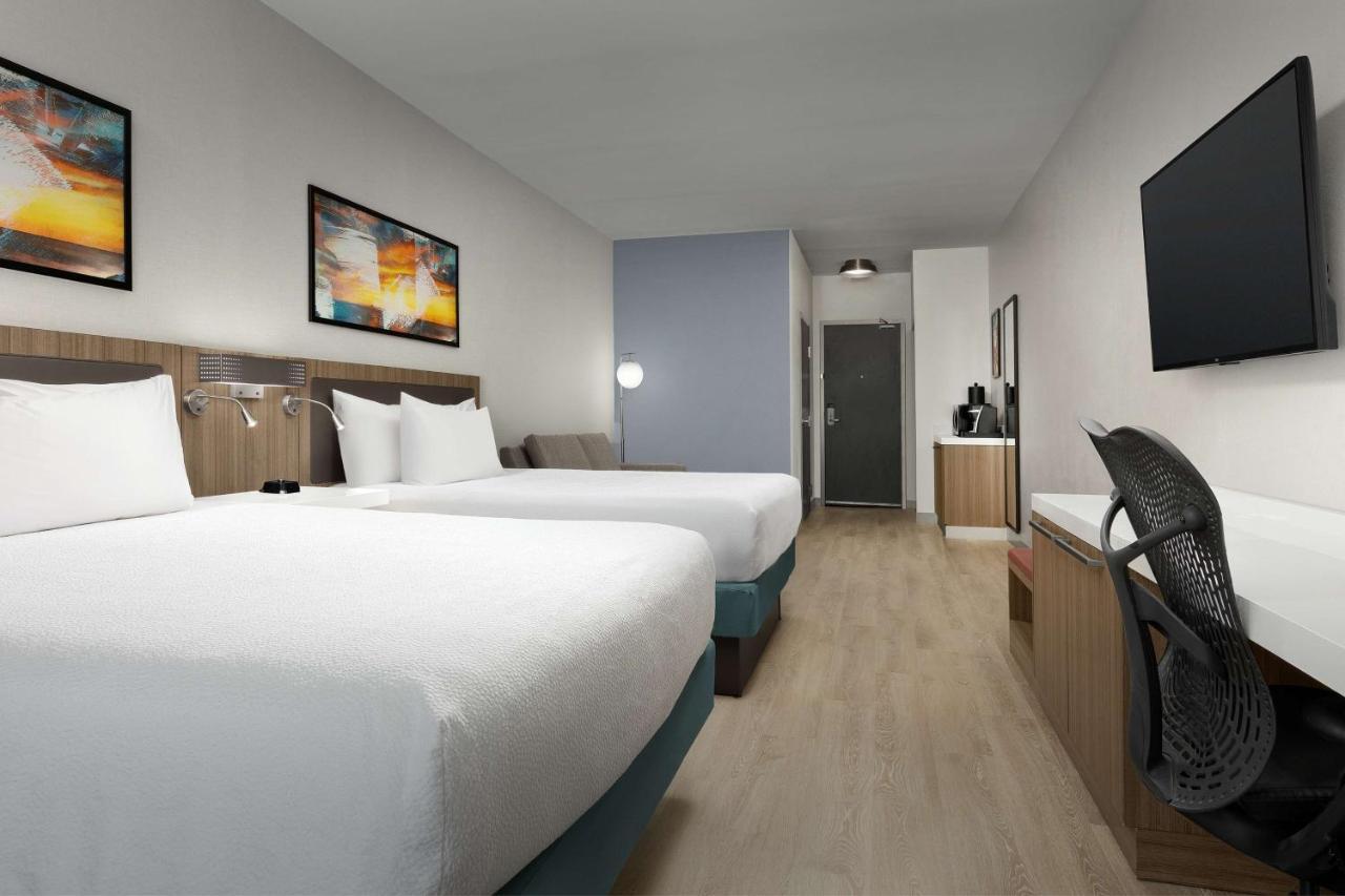 Queen Room with Two Queen Beds and Sofa Bed