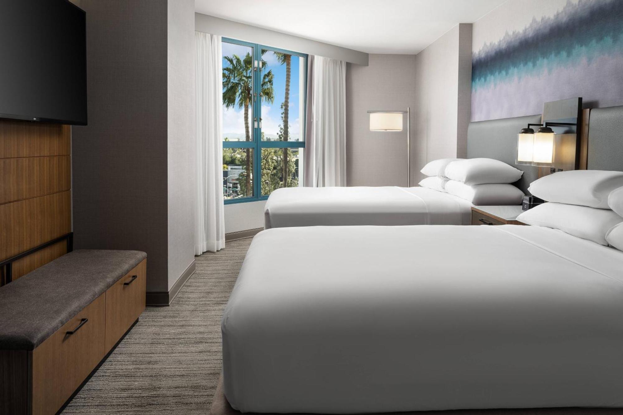 One Bedroom Suite with Twin Beds and a Sofa,1541155732:JPEG