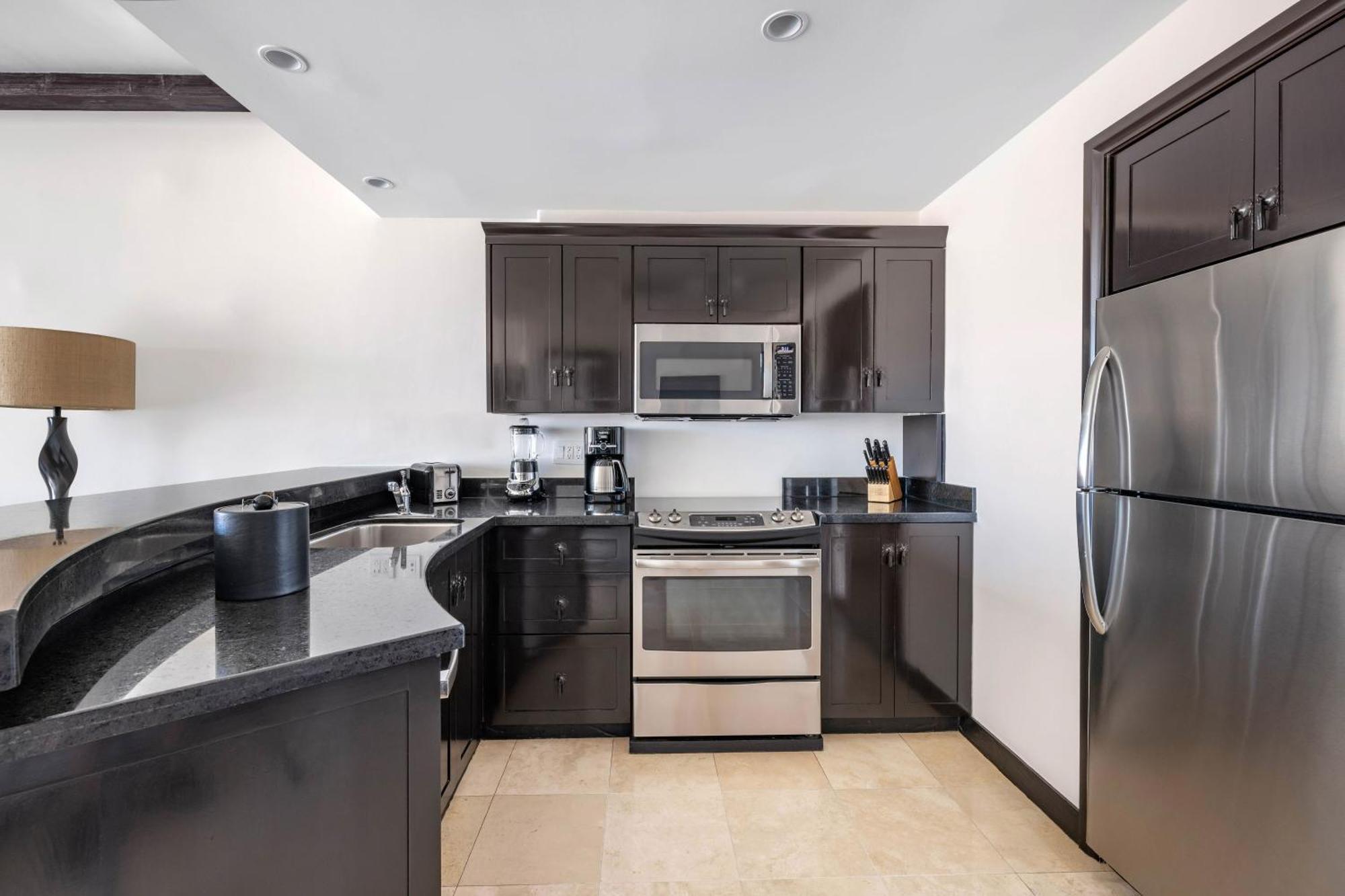 Two Bedroom Suite with Partial Pool View and Balcony