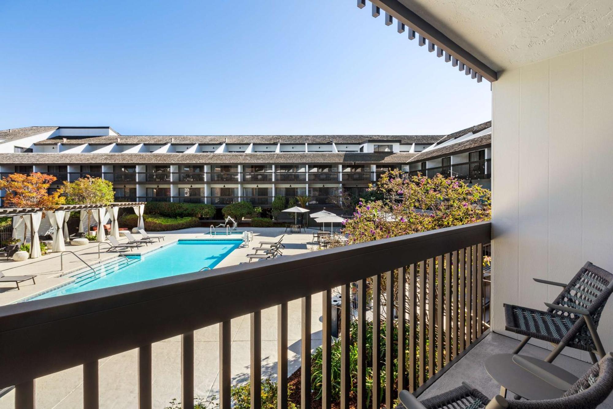 Queen Room with Two Queen Beds - Pool View and Balcony