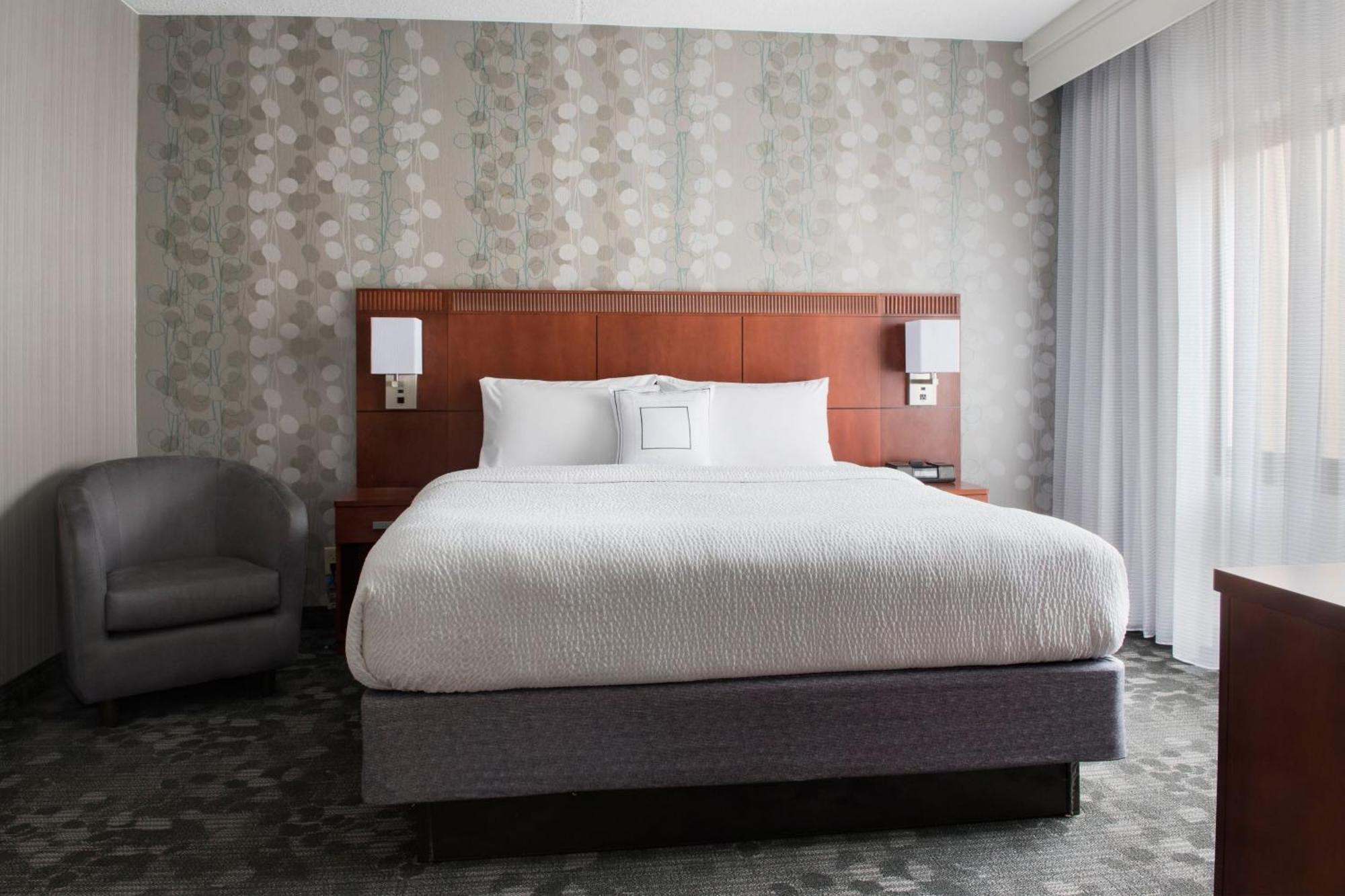 One-Bedroom King Suite with Courtyard View and Sofa Bed
