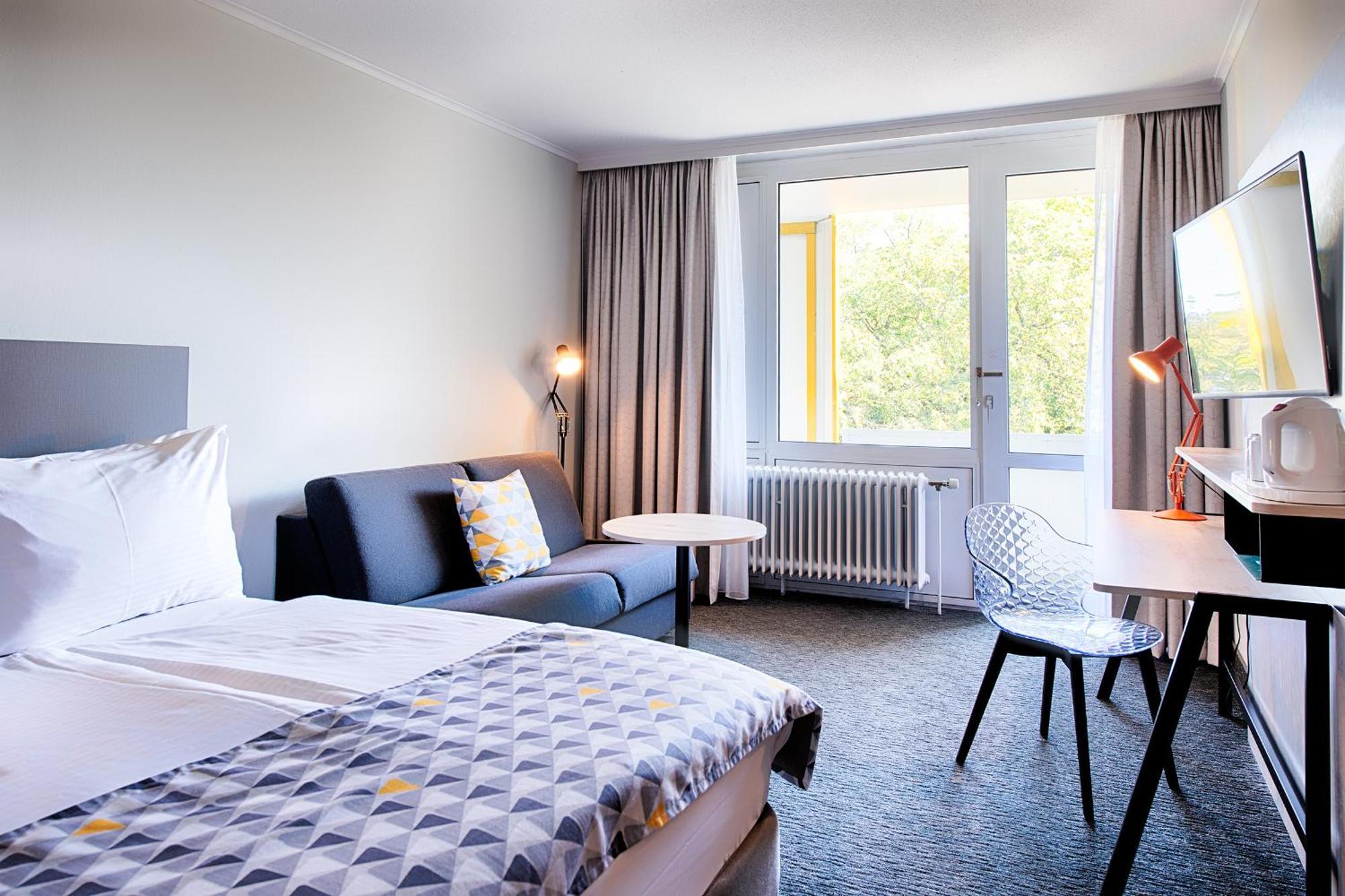 Standard Queen Room with Sofa Bed and Balcony