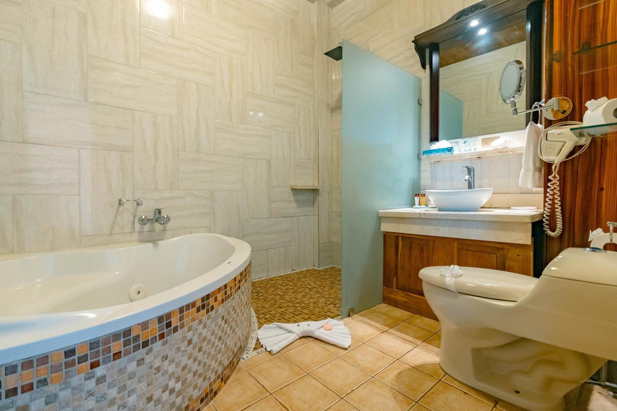 Deluxe Room with Partial Ocean View,1665409311:JPEG