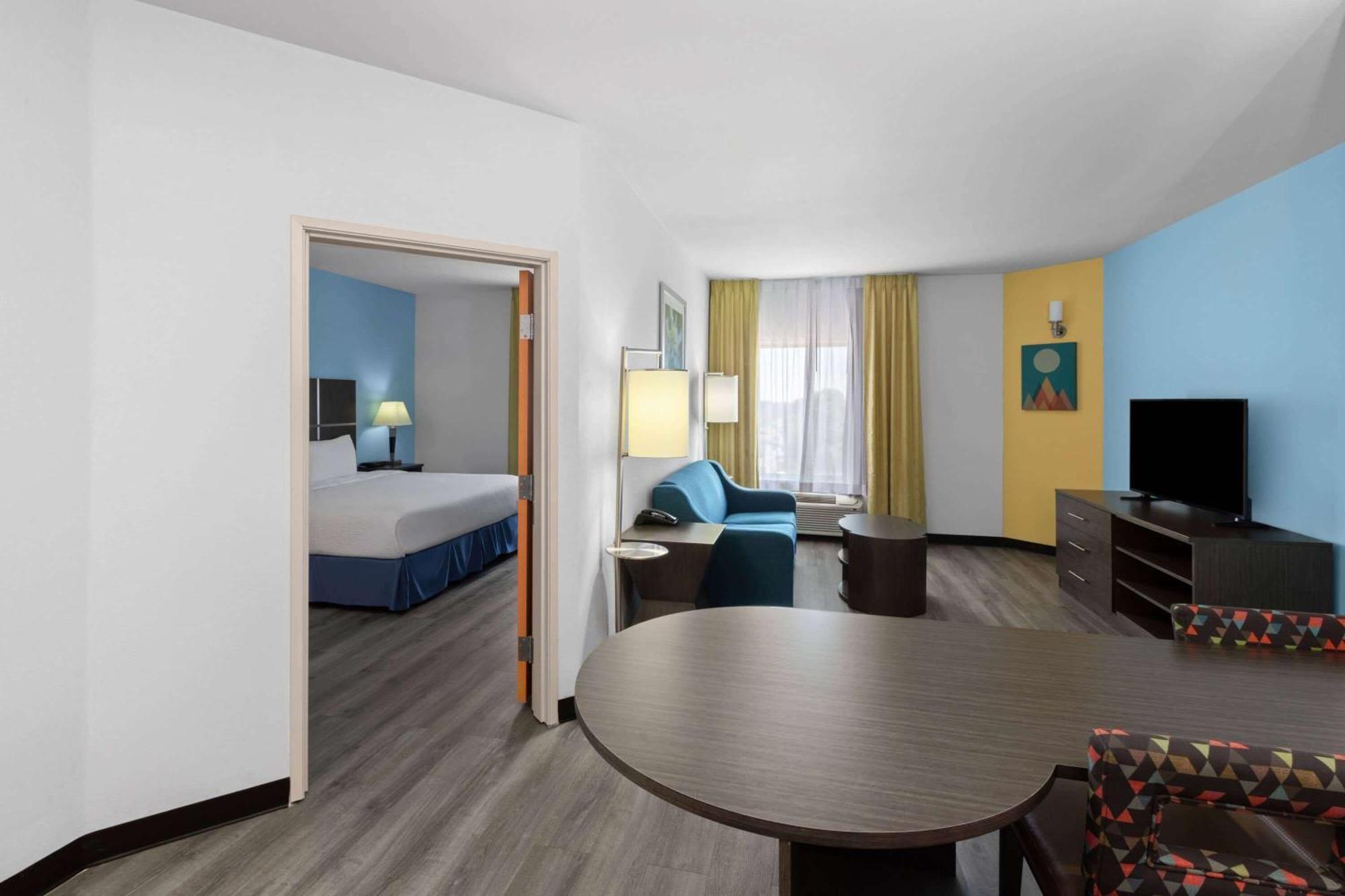 1 King Bed, Deluxe Mobility/Hearing Access Suite, Tub w/ Grab Bars, Non-Smoking