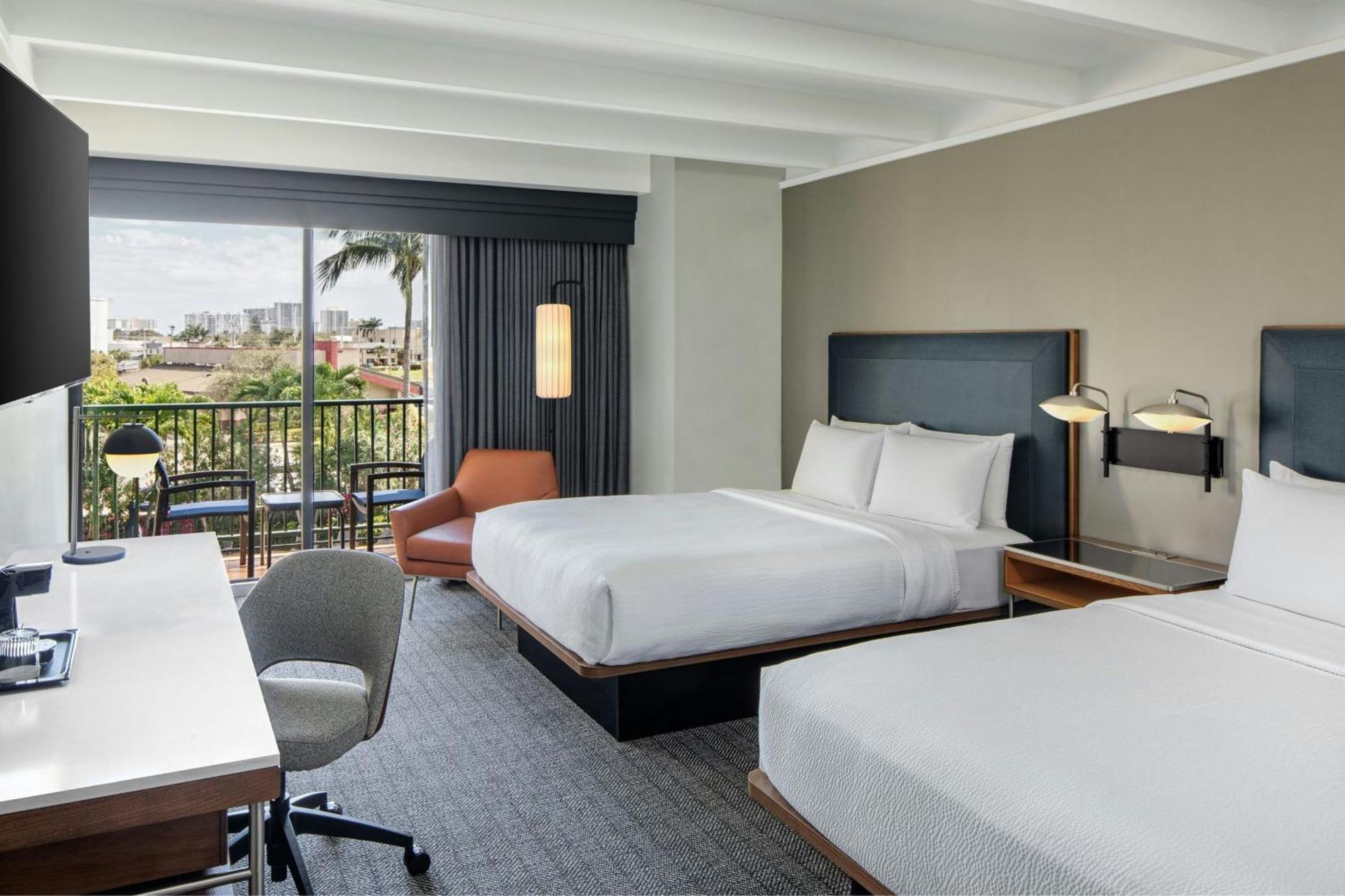 Queen Room with Two Queen Beds and Pool View - Ground Floor