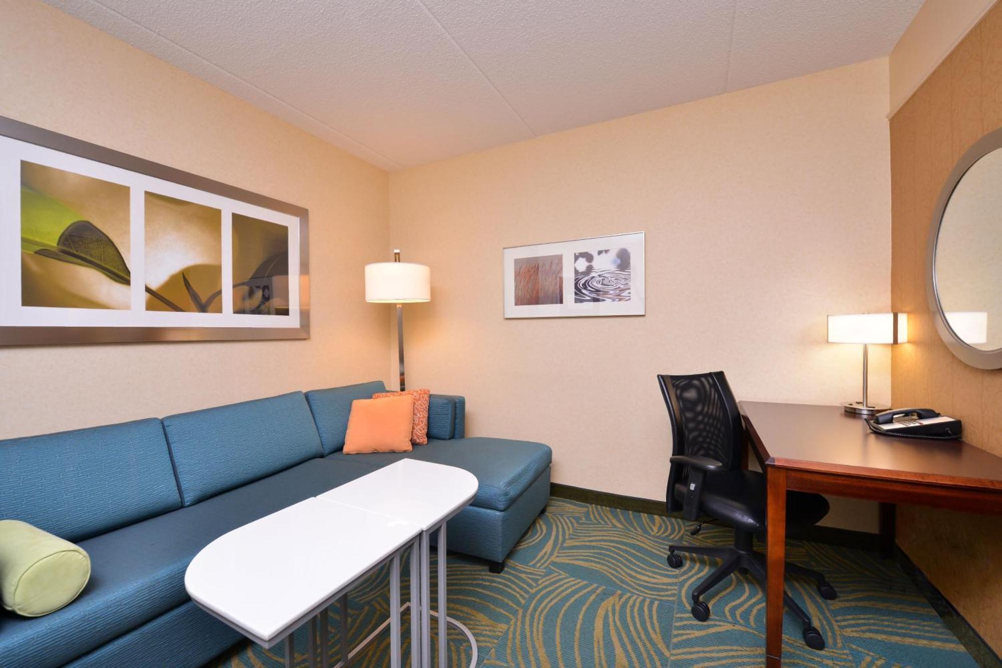 Studio with Two Queen Beds and Sofa Bed - Mobility and Hearing Accessible with Roll-in Shower
