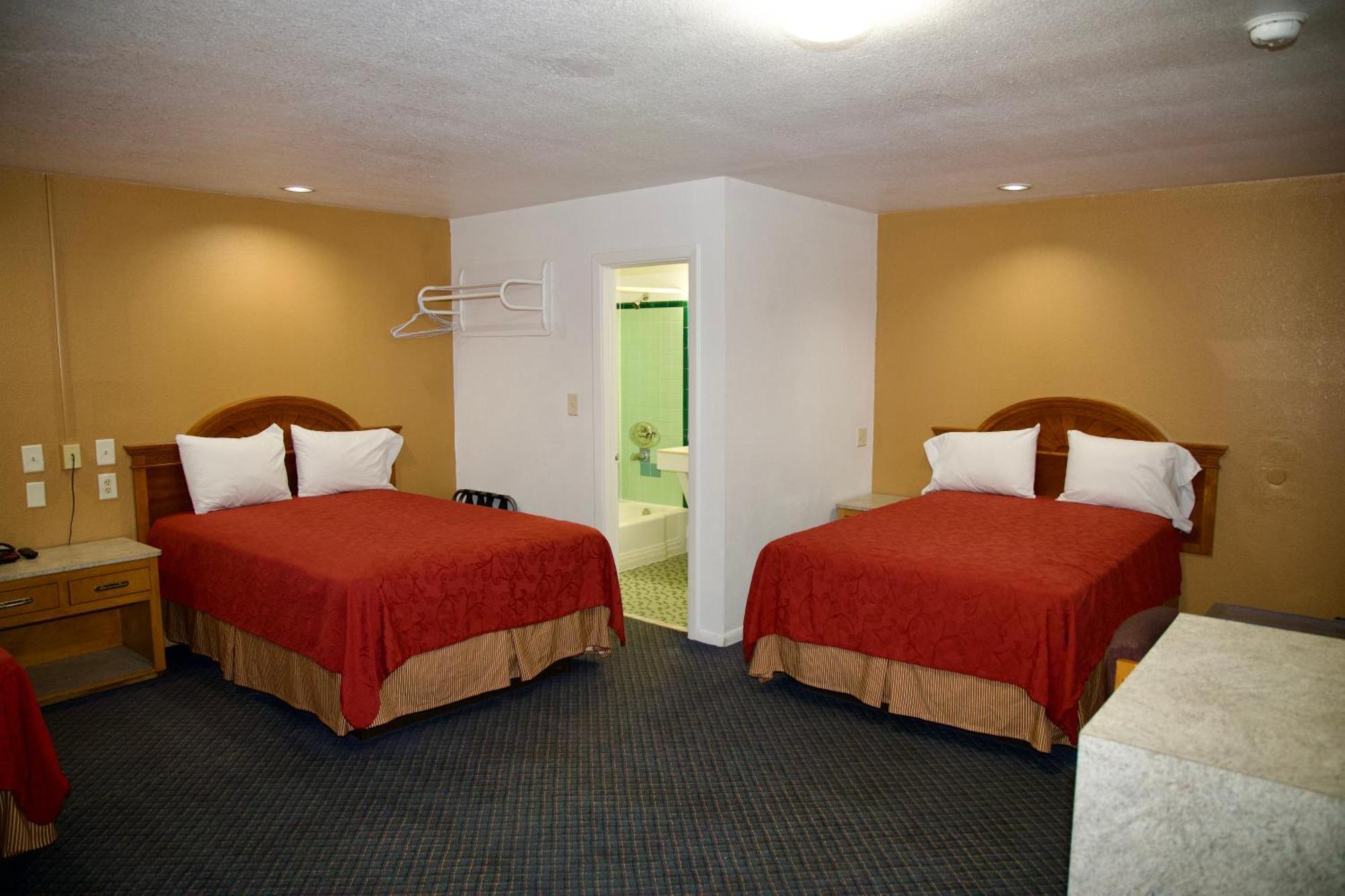 Room with Three Double Beds