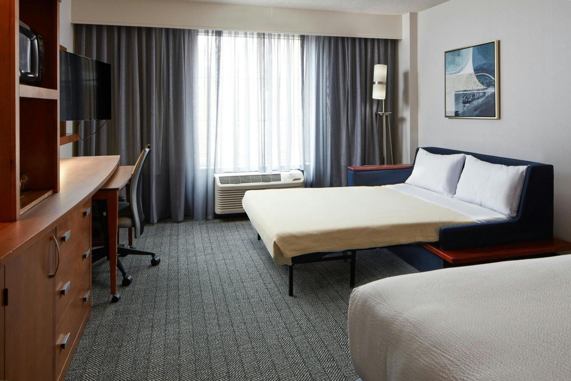 King Room with Roll-In Shower and Sofa Bed - Mobility Access