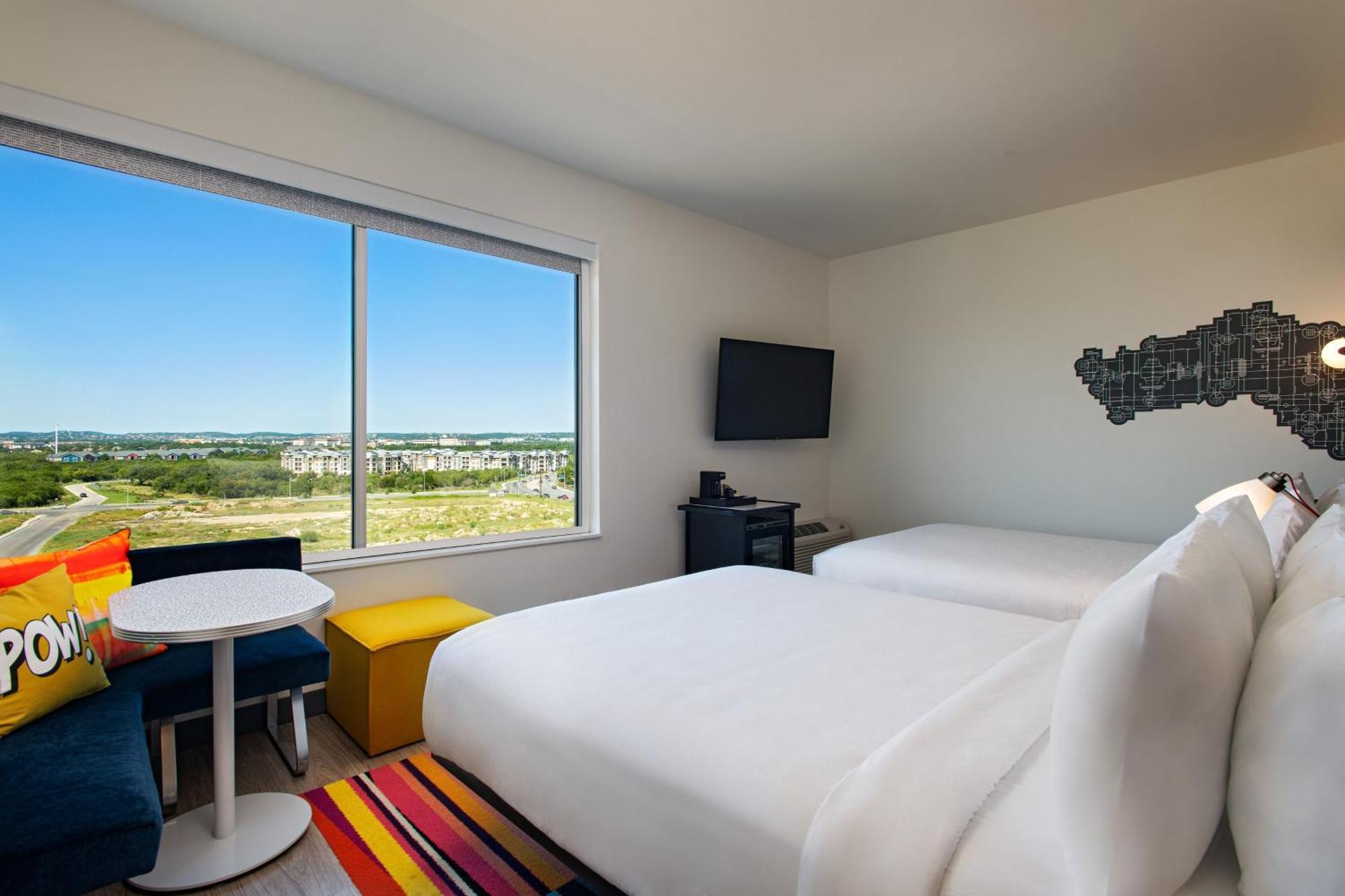 Deluxe Corner Queen Room with Two Queen Beds