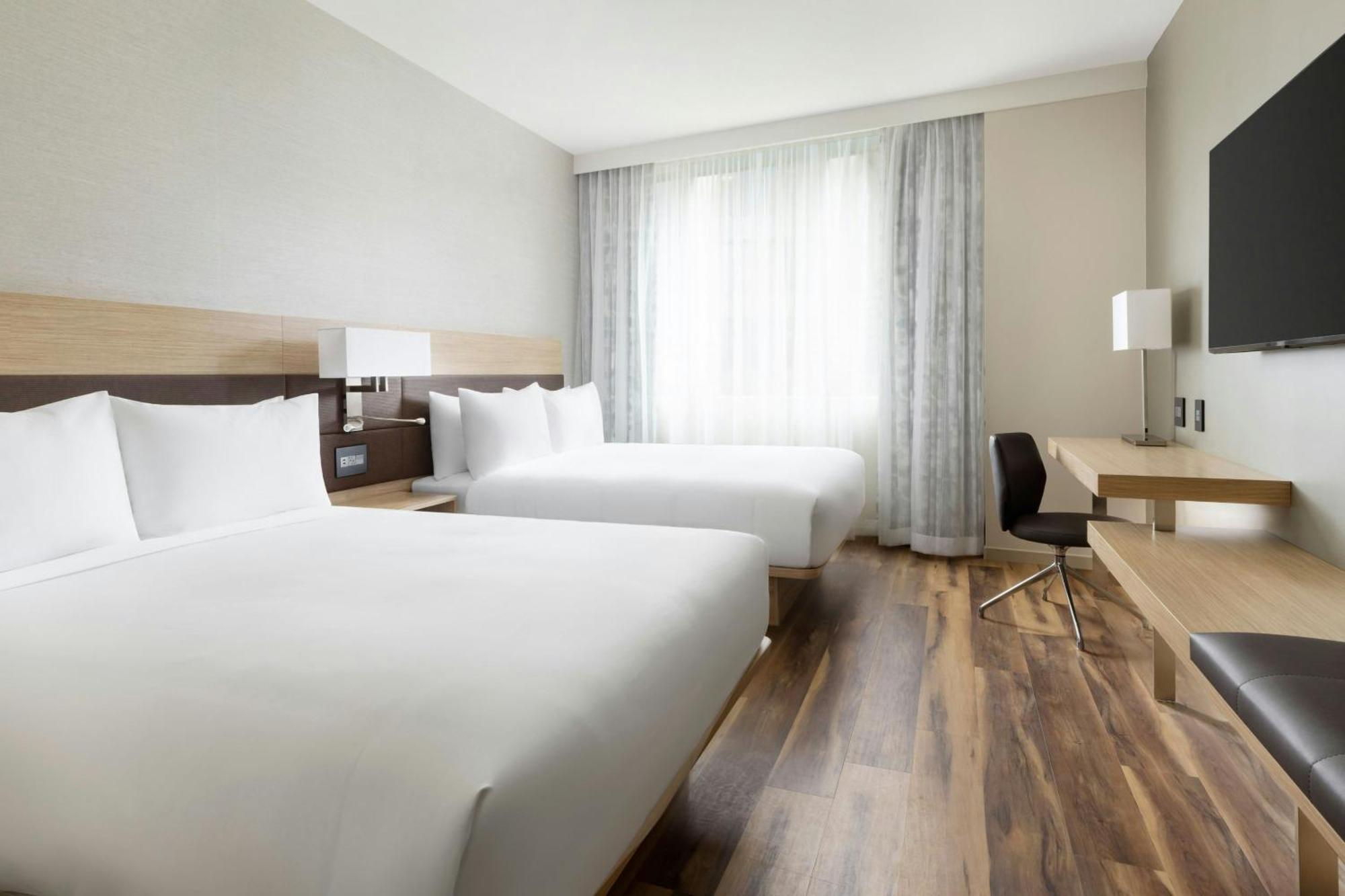 Queen Room with Two Queen Beds and City View