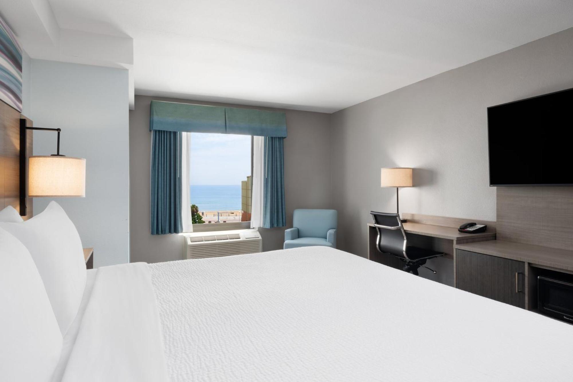 Standard King Room with Sofa Bed and Partial Ocean View