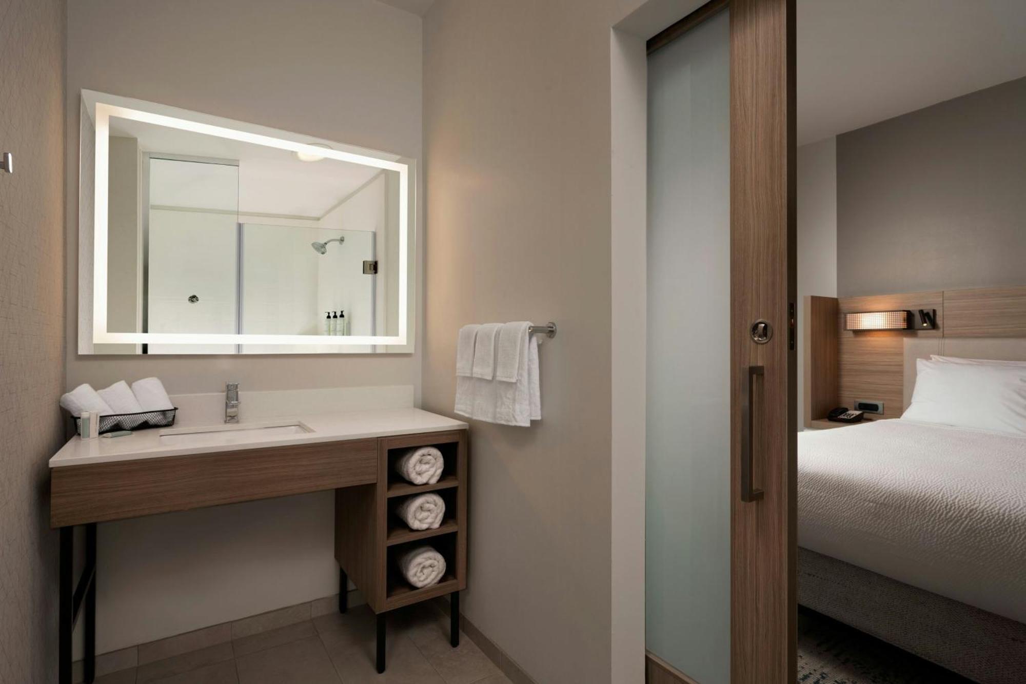 Queen Suite with Two Queen Beds, Roll-In Shower, Transfer Shower and Trundle Sofa - Mobility Access/Hearing Accessible