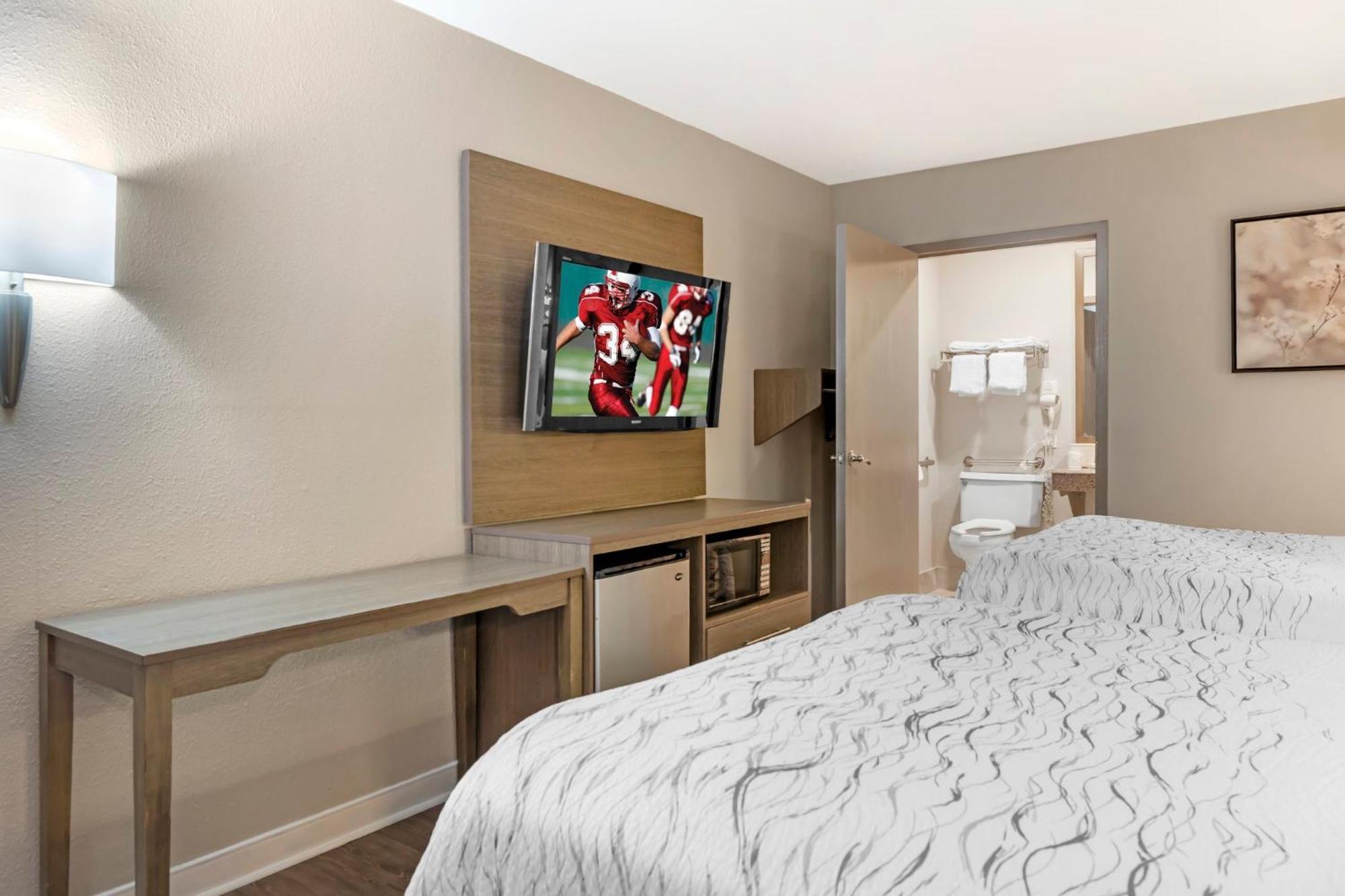 Deluxe Room with Two Double Beds Disability Access Non-Smoking
