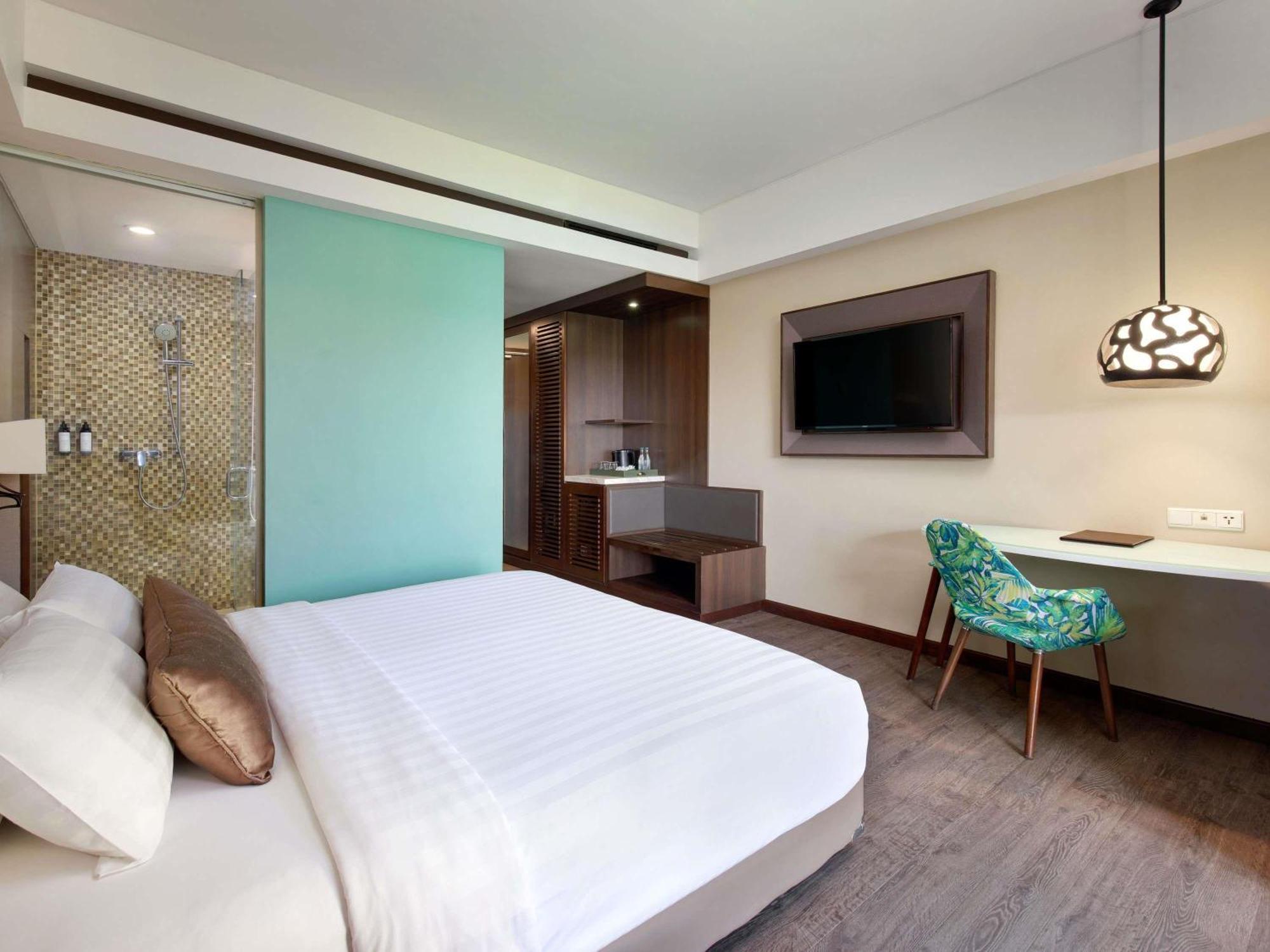 Deluxe Room with Balcony and Pool View
