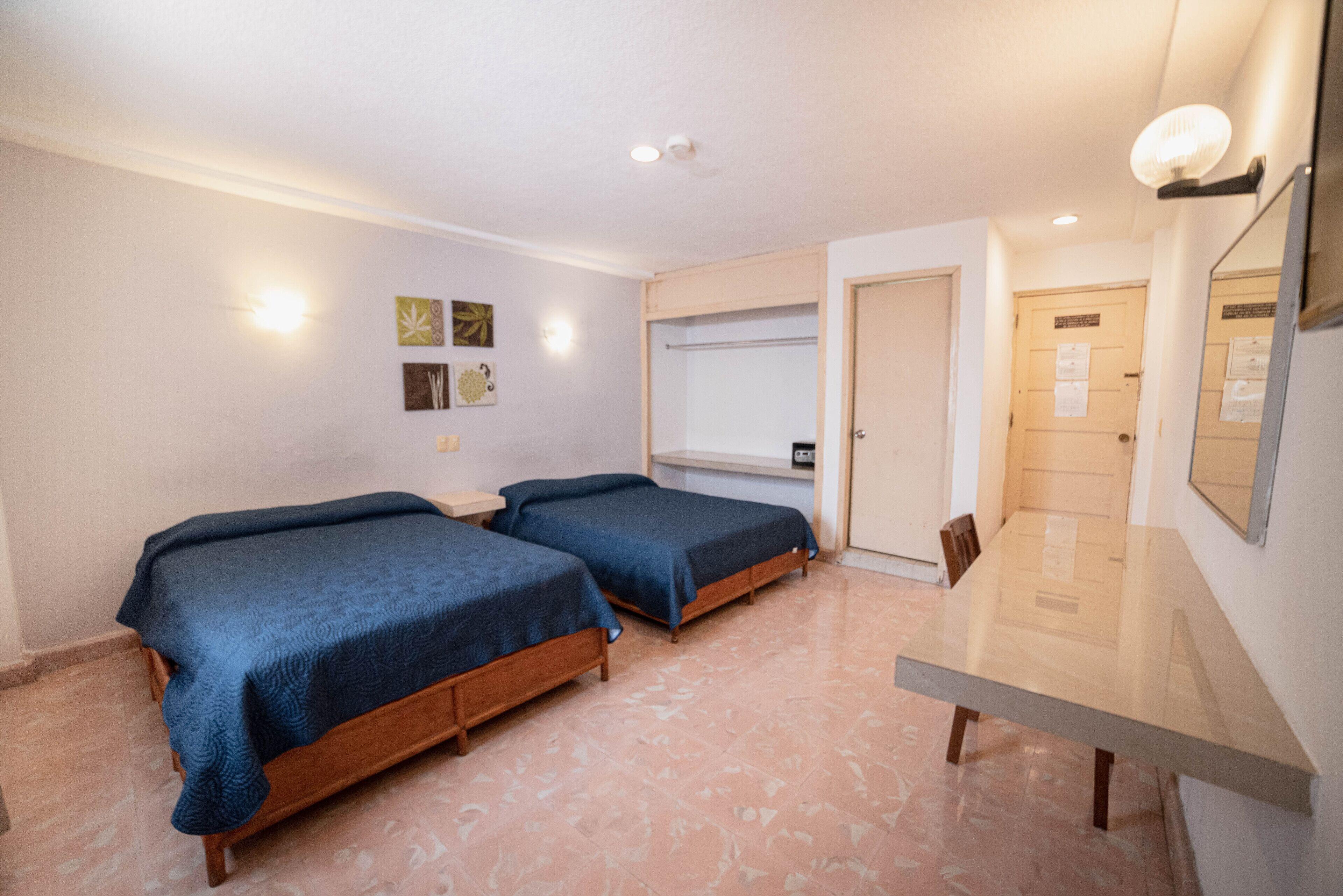 Double Room with Two Double Beds (3 Adults)