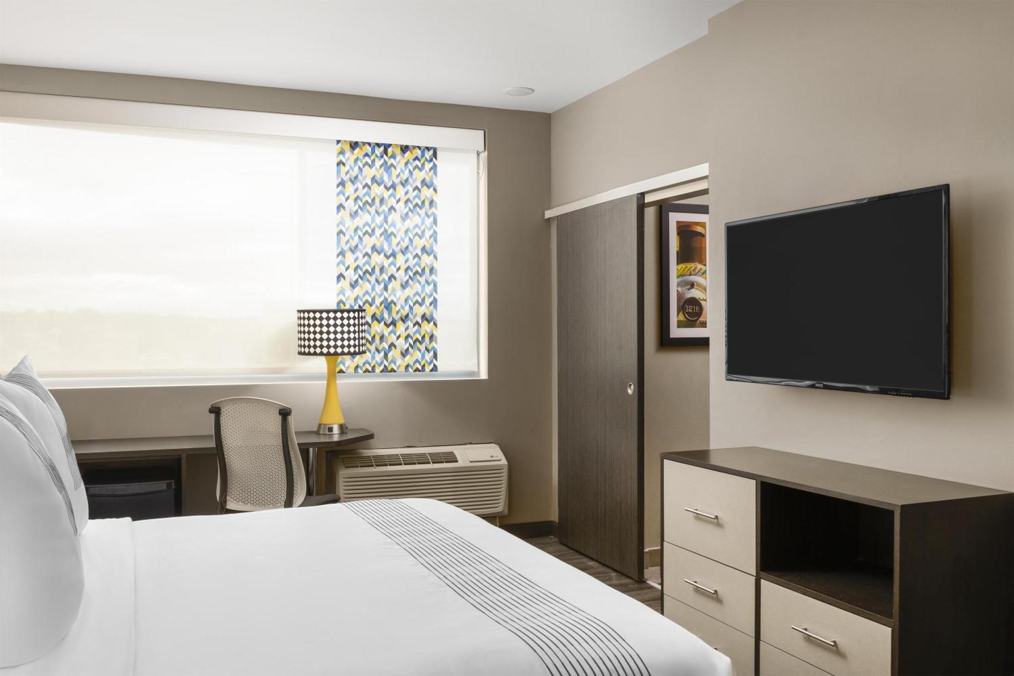 Larger King Room with Mobility Accessible Roll-In Shower