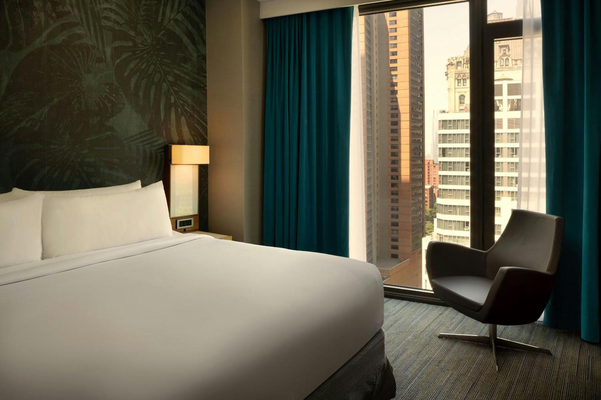 Superior Room with Two Double Beds with City and River View