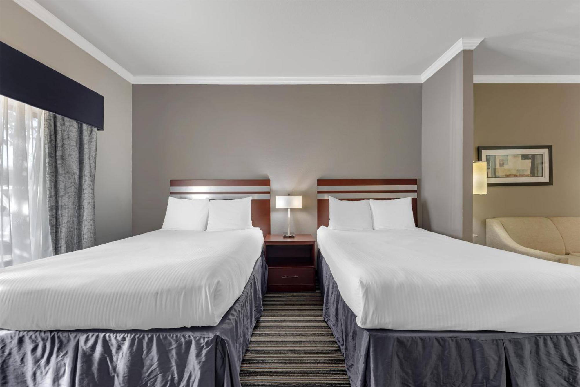 Queen Suite with Two Queen Beds and Sofa Bed
