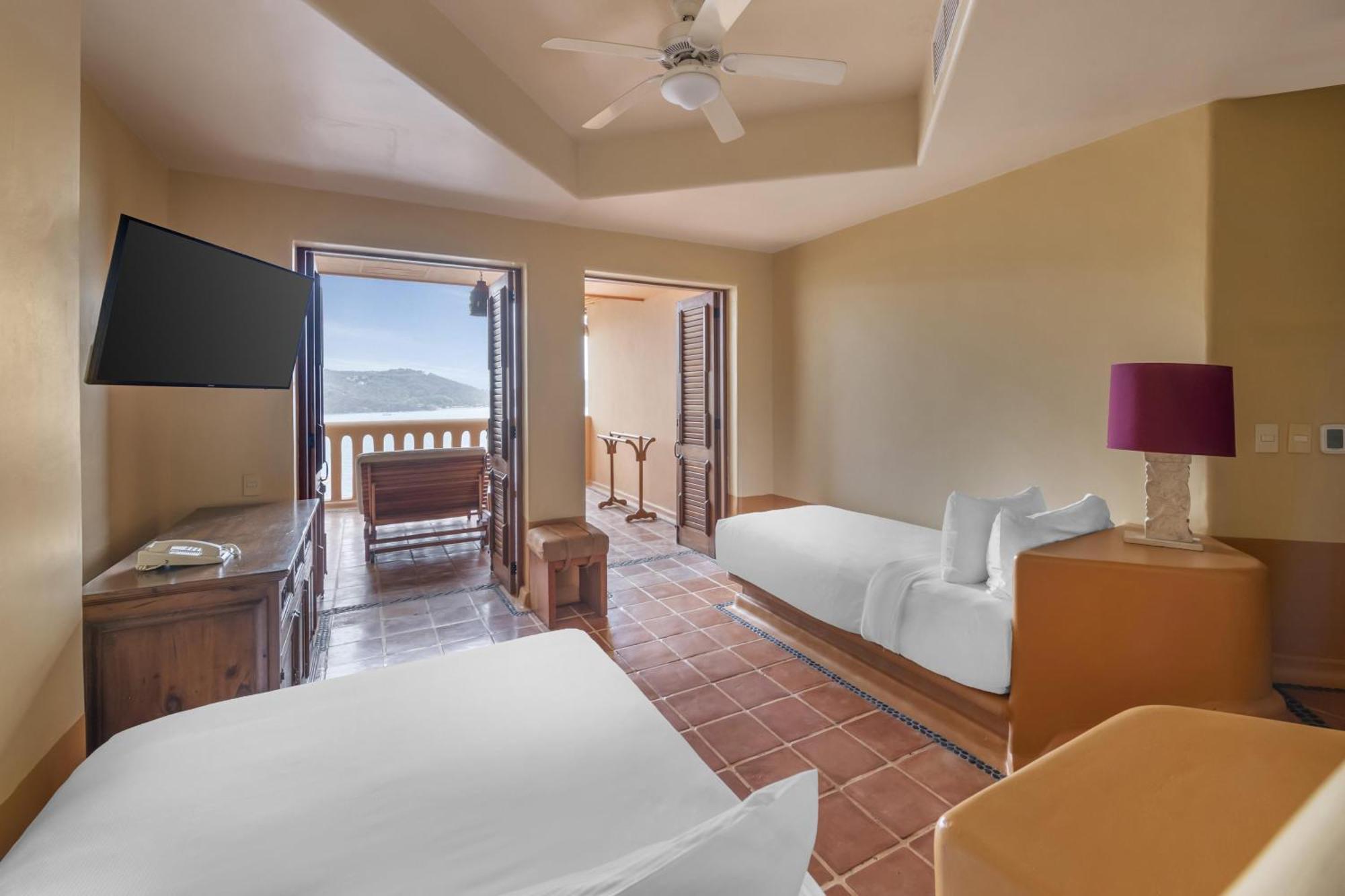 Two-Bedroom King Suite with One Twin and One Double Bed - Ocean View