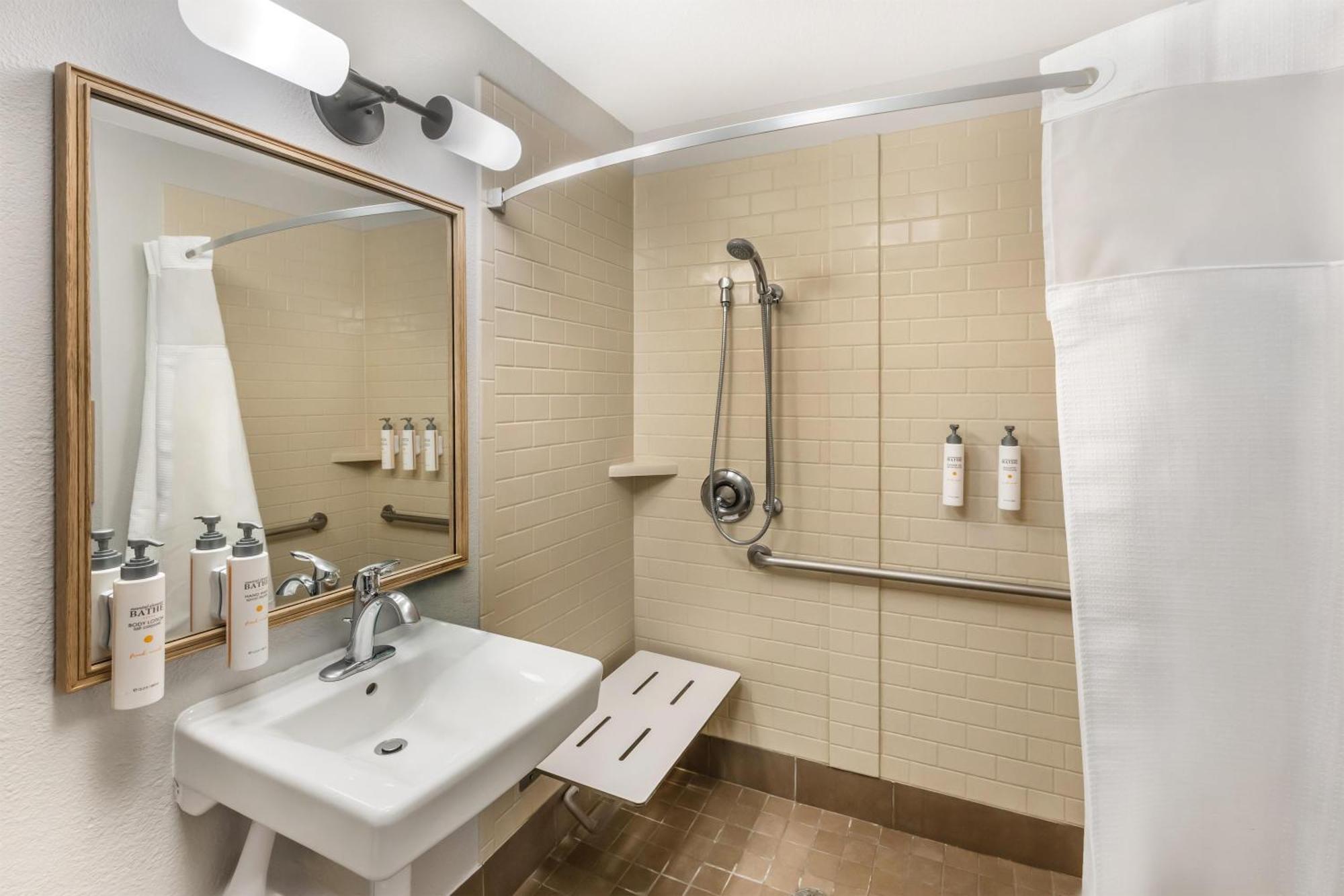 Queen Studio Suite with Roll-In Shower - Mobility Accessible