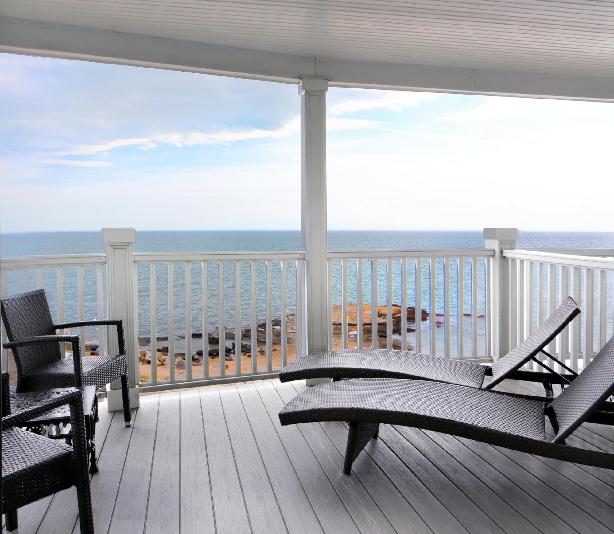 King Room with Balcony and Chaise Lounges