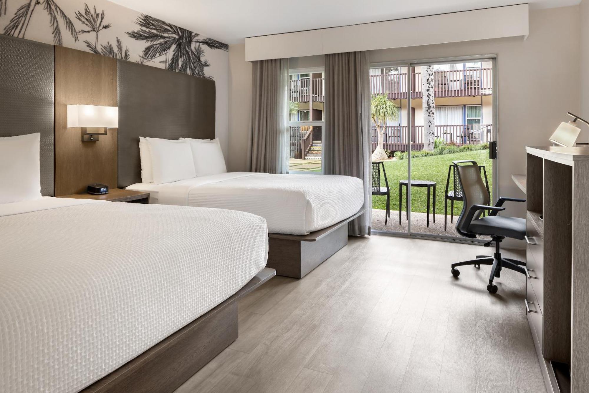 Deluxe Queen Room with Two Queen Beds and Courtyard View
