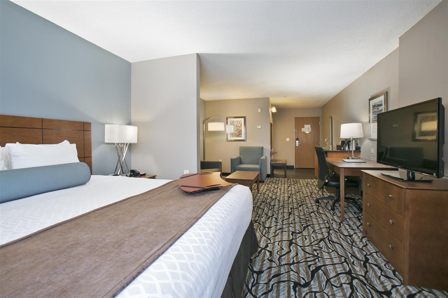 King Suite with Roll-In Shower, Sofa Bed and Spa Bath - Disability/Non-Smoking