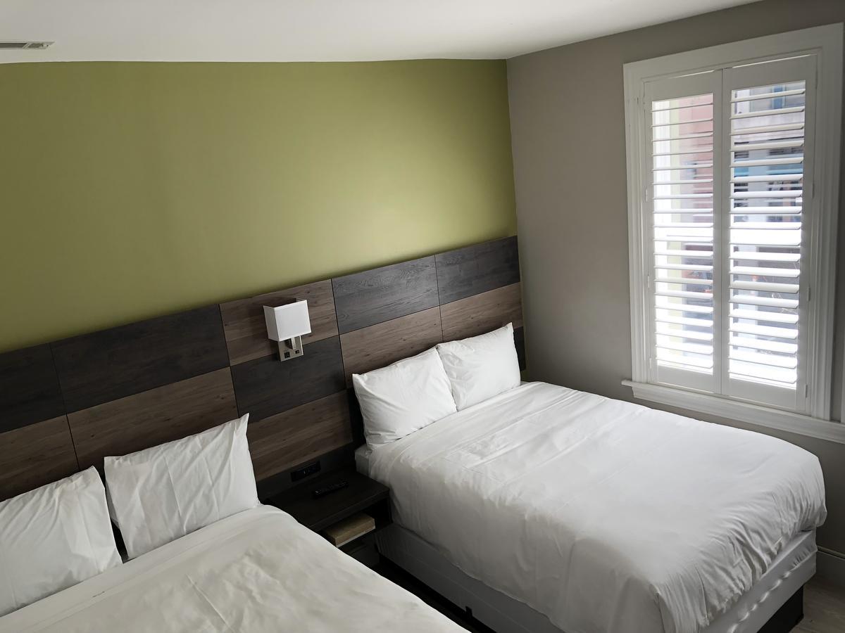 Two Double Beds With Private Bathroom