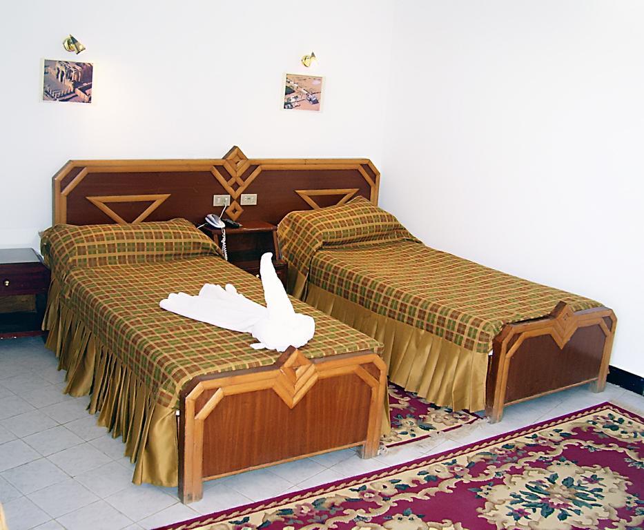 Standard Triple Side Nile View Room