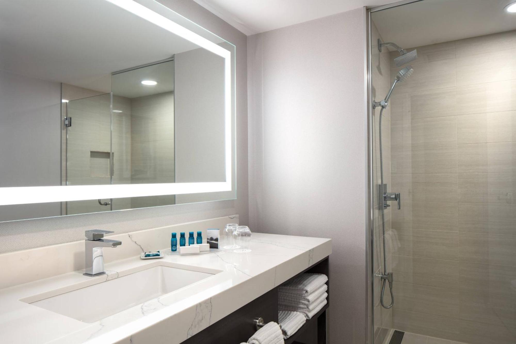 Deluxe Queen Suite with Two Queen Beds and Sofa Bed - City View