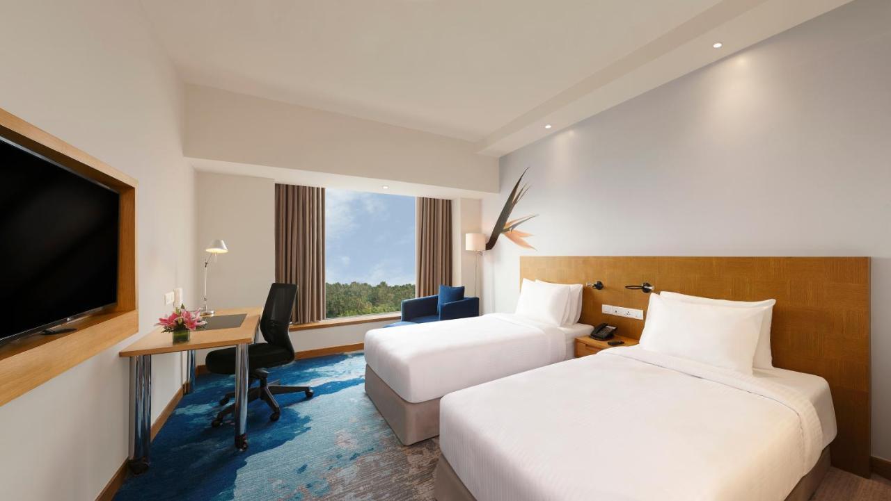 Superior 2 Single Beds Poolside