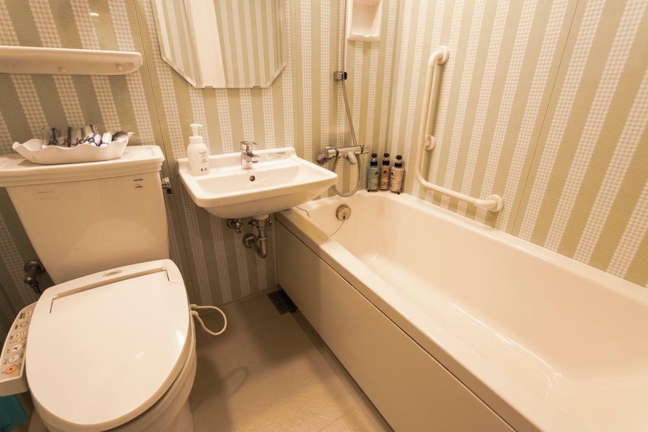 Twin Room with Extra Bed - Non-Smoking,805582470:JPEG