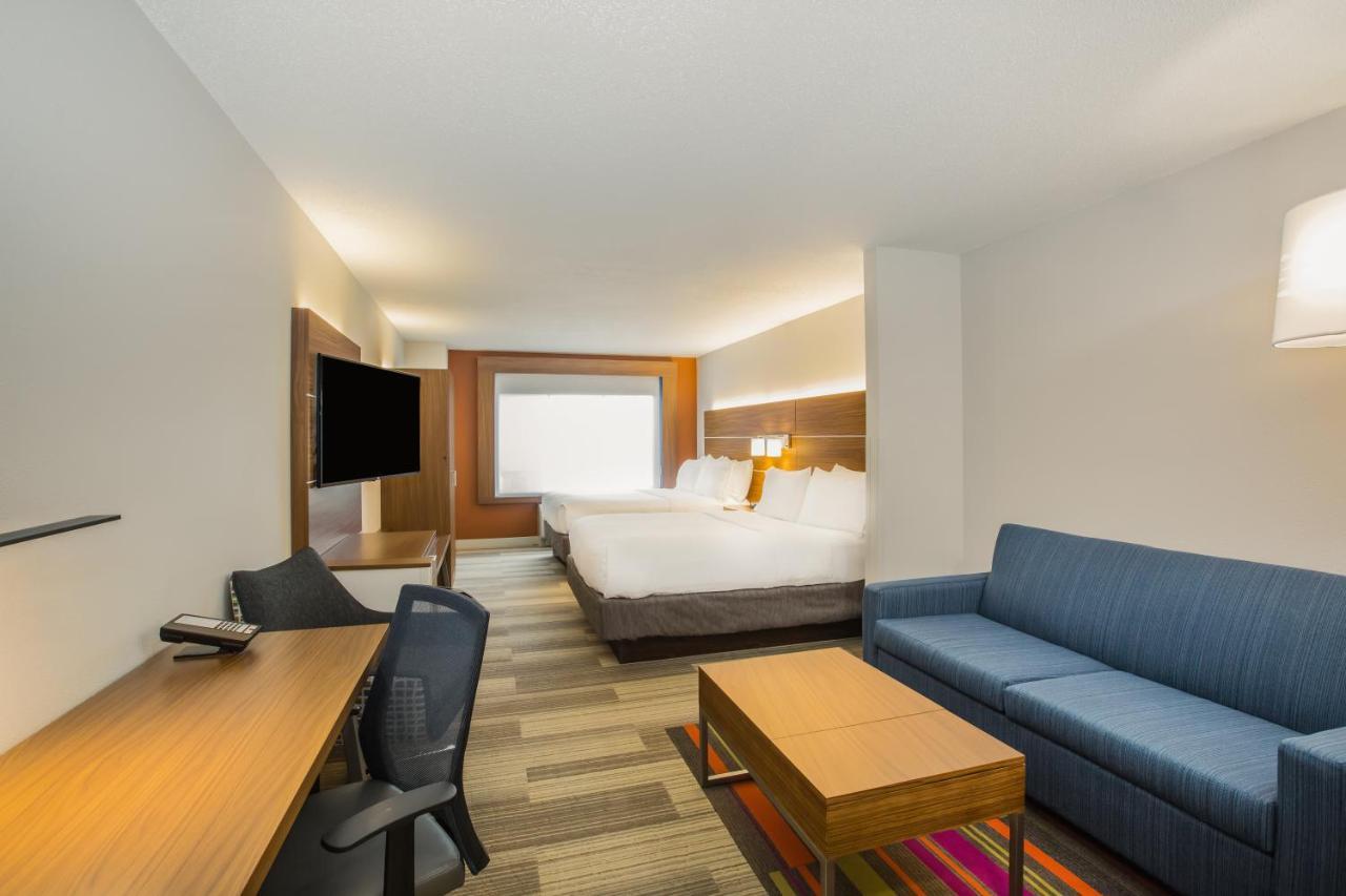 Queen Suite with Two Queen Beds and Sofa Bed