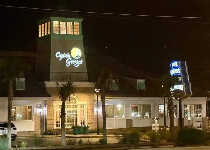 New 2026-Ocean Sands Beach Boutique Inn-Sauna And Salt-Mineral Pool -Free Beach Bikes And Famous Beach- Fresh Baked Cookies And Popcorn - Bathrobes And Sunscreen In All Rooms-Ultra Sparkling-Free Laundry- 4 Grand Black Beds-Call Now & Save-1-252-Aha-