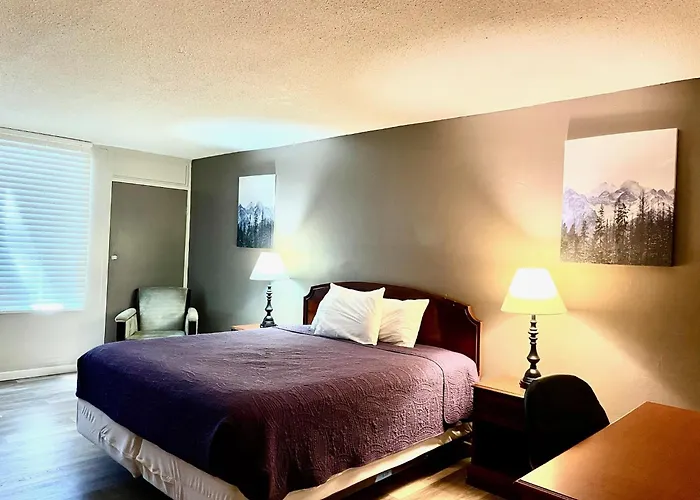 Apm Inn & Suites